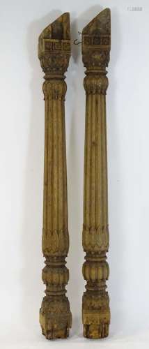 A pair of Regency carved pine columns with Corinthian style ...