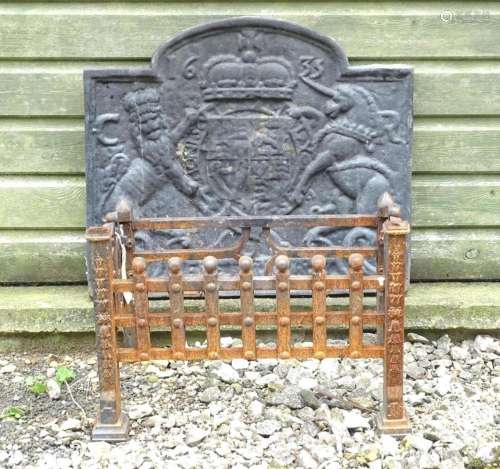 A cast iron fireback, decorated with the Royal Coat of Arms ...