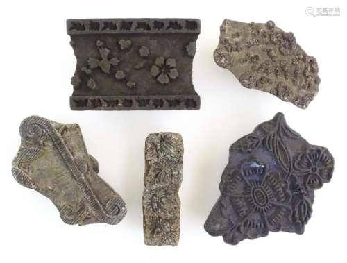 Five assorted carved wooden printing blocks with floral and ...