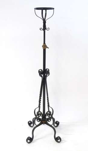 An Arts & Crafts wrought iron and copper telescopic lamp...