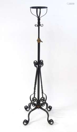 An Arts & Crafts wrought iron and copper telescopic lamp...