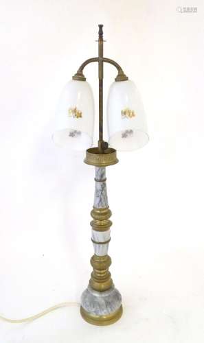 A mid 20thC table lamp, the column consisting of alternating...