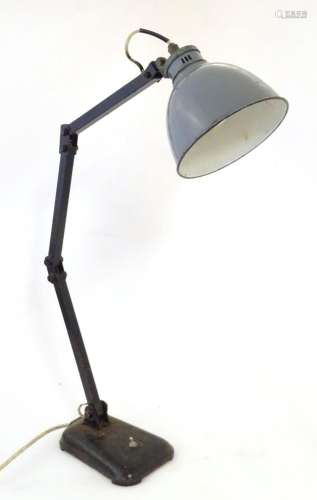 A mid 20thC vintage industrial table / desk lamp, of steel c...