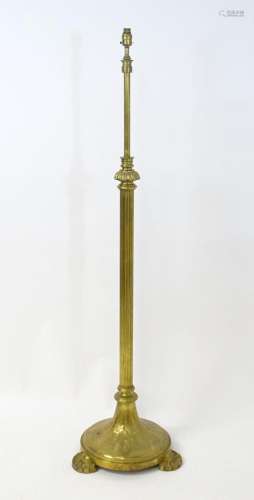 An early 20thC Hinks brass standard lamp, the reeded column ...
