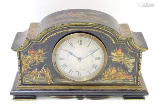 A black lacquered chinoiserie mantel clock with Roman numera...