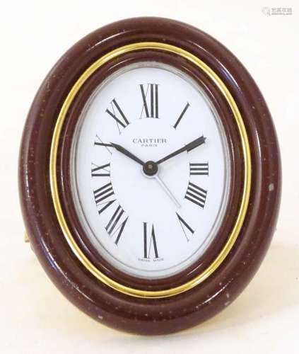 A Cartier Paris travel alarm clock with easel back. 3 1/2&qu...
