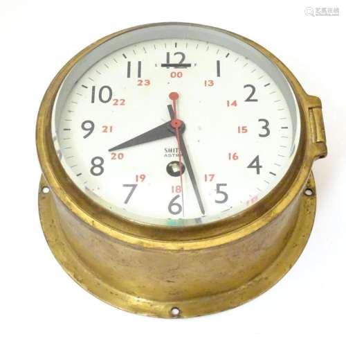 A Smiths Astral maritime / bulkhead clock the dial with blac...