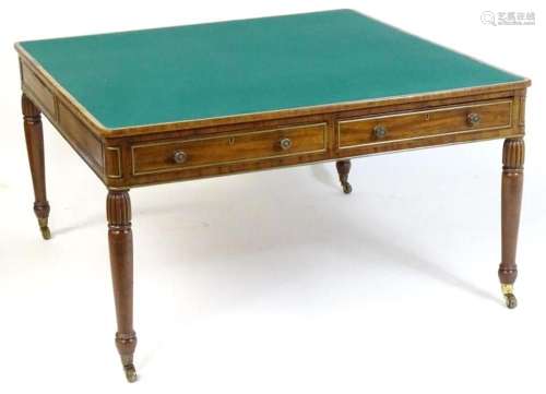 A large Regency mahogany writing table / library table havin...