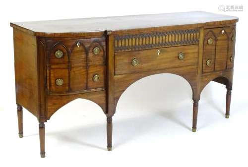 An early / mid 19thC mahogany Gothic sideboard, having a D-s...