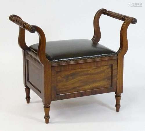 An early / mid 19thC mahogany piano stool / window seat with...