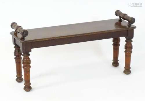 A late 19thC / early 20thC mahogany stool / window seat, hav...