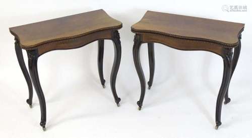 A pair of 19thC rosewood card tables of serpentine form, hav...