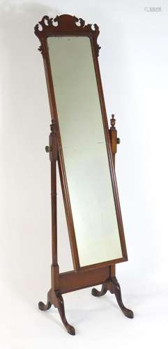 A late 19thC / early 20thC mahogany cheval mirror, with a sh...