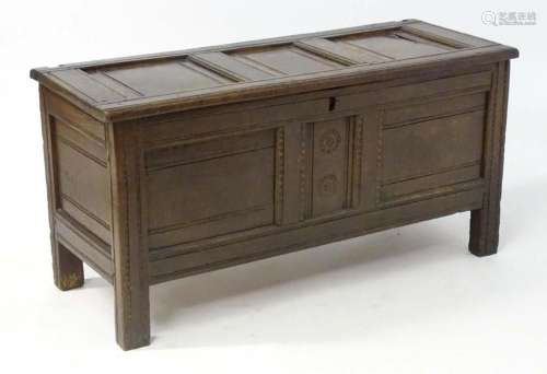 A late 17thC oak coffer of peg jointed construction, have a ...