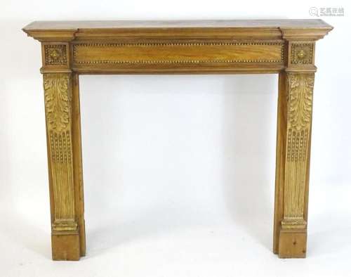 A Victorian pine fire surround with an inverted breakfront t...