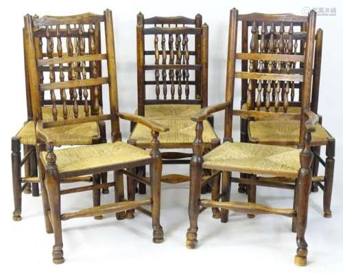A set of eight spindle back dining chair, having envelope ru...