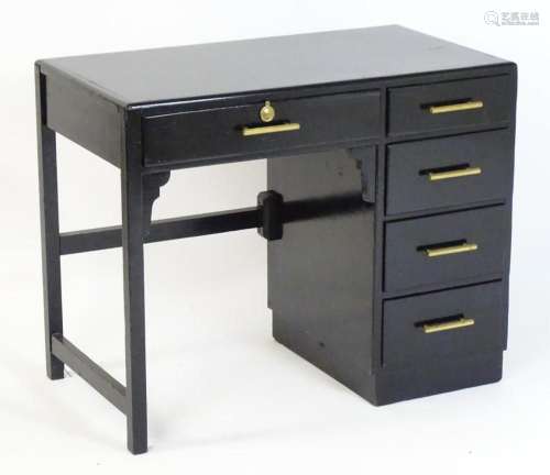 An early / mid 20thC Art Deco writing desk with a rectangula...