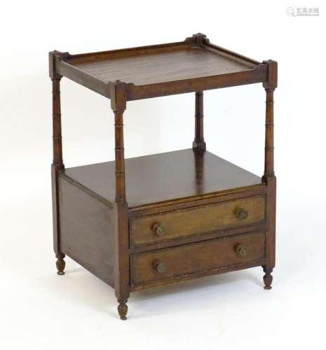 A mid 19thC mahogany two tier stand, having a shaped upstand...
