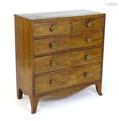 A Regency period mahogany chest of drawers comprising two sh...