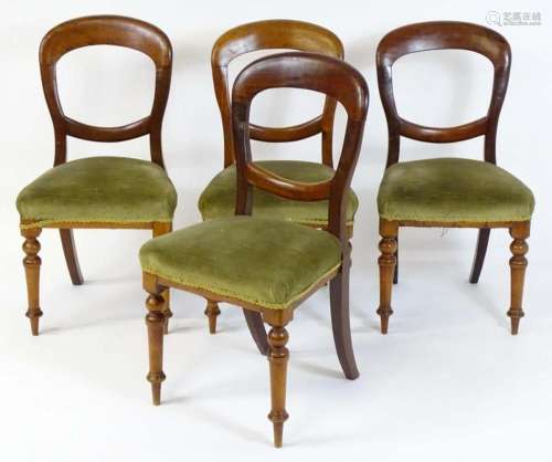 A set of four 19thC mahogany balloon back chairs, having spr...
