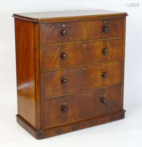 A large Victorian mahogany chest of drawers with a moulded t...