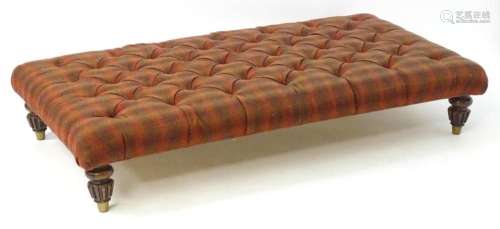 A large late 20thC footstool with deep buttoned Harris tweed...