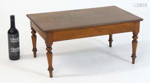 A 19thC mahogany footstool with a rectangular top above four...