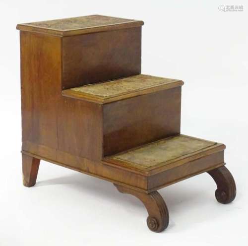 A mid 19thC mahogany three tier library step with a lifting ...