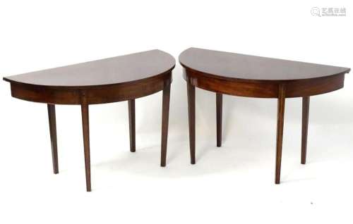 A pair of 19thC mahogany D-end tables, each having four tape...