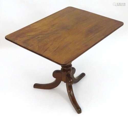 A 19thC mahogany tilt top table with a rectangular top above...