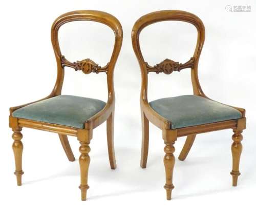 A pair of mid 19thC mahogany dining chairs with balloon back...