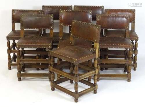 A group of eight early 20thC matched dining chairs, having l...