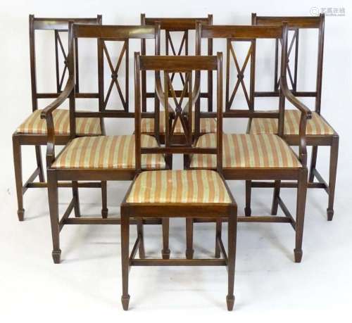 A set of six early 20thC mahogany dining chairs with cross b...
