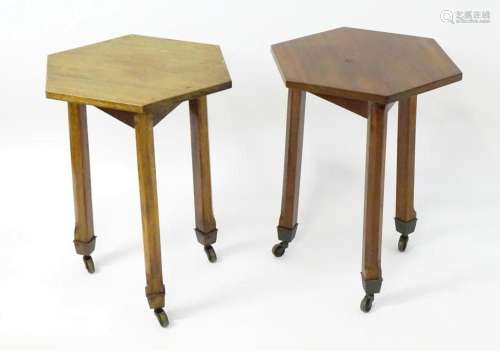 A pair of early 20thC octagonal topped tables raised on cham...
