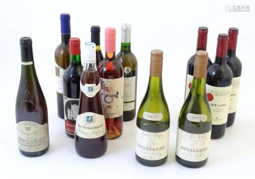 Twelve bottles of wine, comprising: a 75cl bottle of Lasserr...