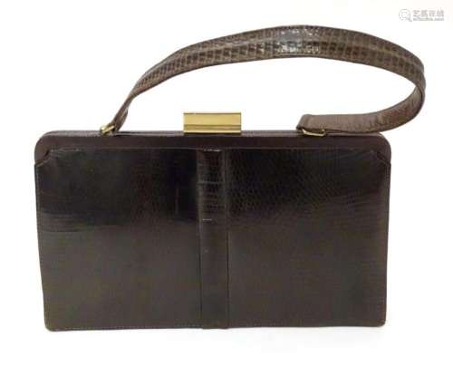A snakeskin leather bag by Mappin & Webb Ltd along with ...