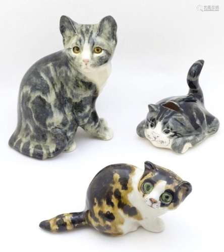 Two Winstanley models of cats, comprising a seated Tabby cat...