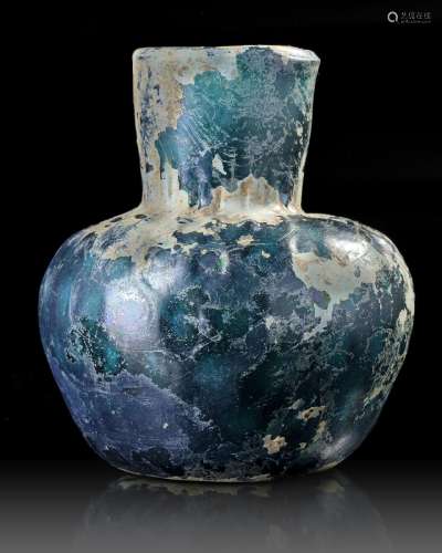 A MOULDED BLUE GLASS BOTTLE, NISHAPUR, NORTH-EAST IRAN, 9TH ...