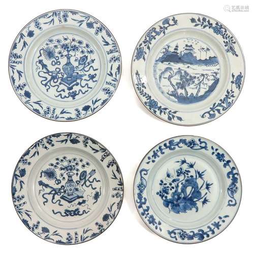 A Collection of 4 Blue and White Plates