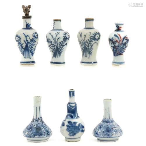 A Collection of 7 Miniature Vases
