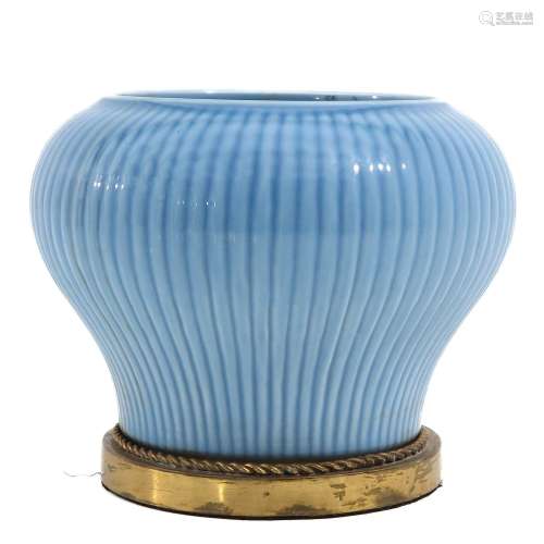 A Blue Glazed Hundred Rib Jar