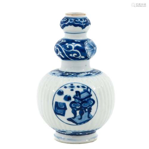 A Small Blue and White Double Gourd Vase