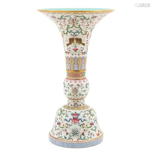 A Famille Rose White Ground Gu Vase