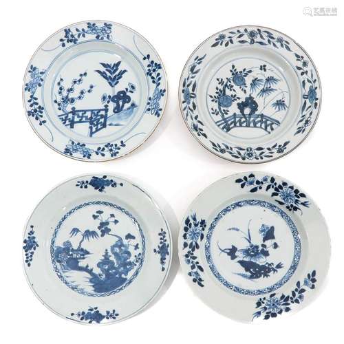 A Collection of 4 Blue and White Plates