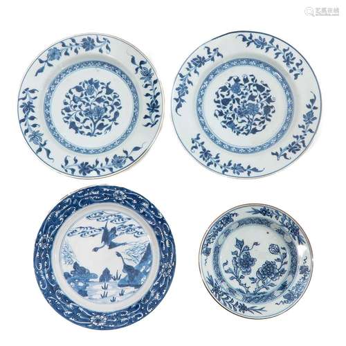 A Collection of 4 Blue and White Plates