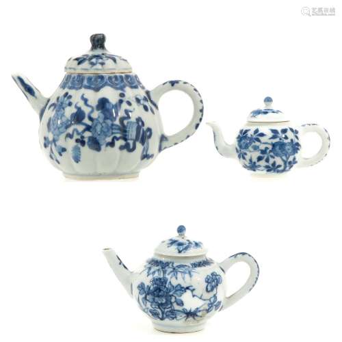 A Collection of 3 Blue and White Teapots