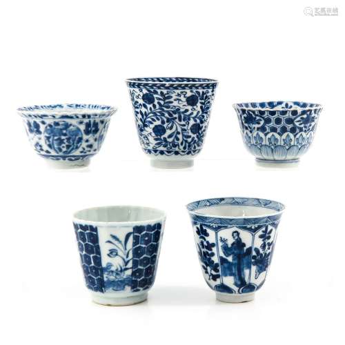 A Collection of 5 Blue and White Cups