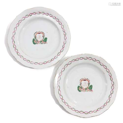 A Pair of Famille Rose Armorial Plates