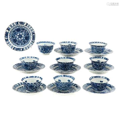 A Collection of 9 Blue and White Cups and Saucers