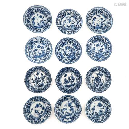 A Series of 12 Small Blue and White Plates